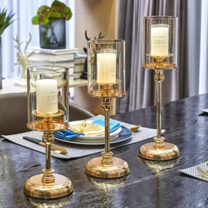 Ensemble de 3 bougeoirs en verre doré pour bougies colonne