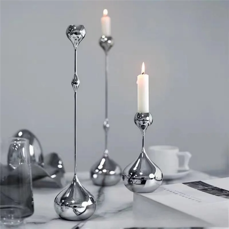 Ensemble de 3 bougeoirs en métal argenté